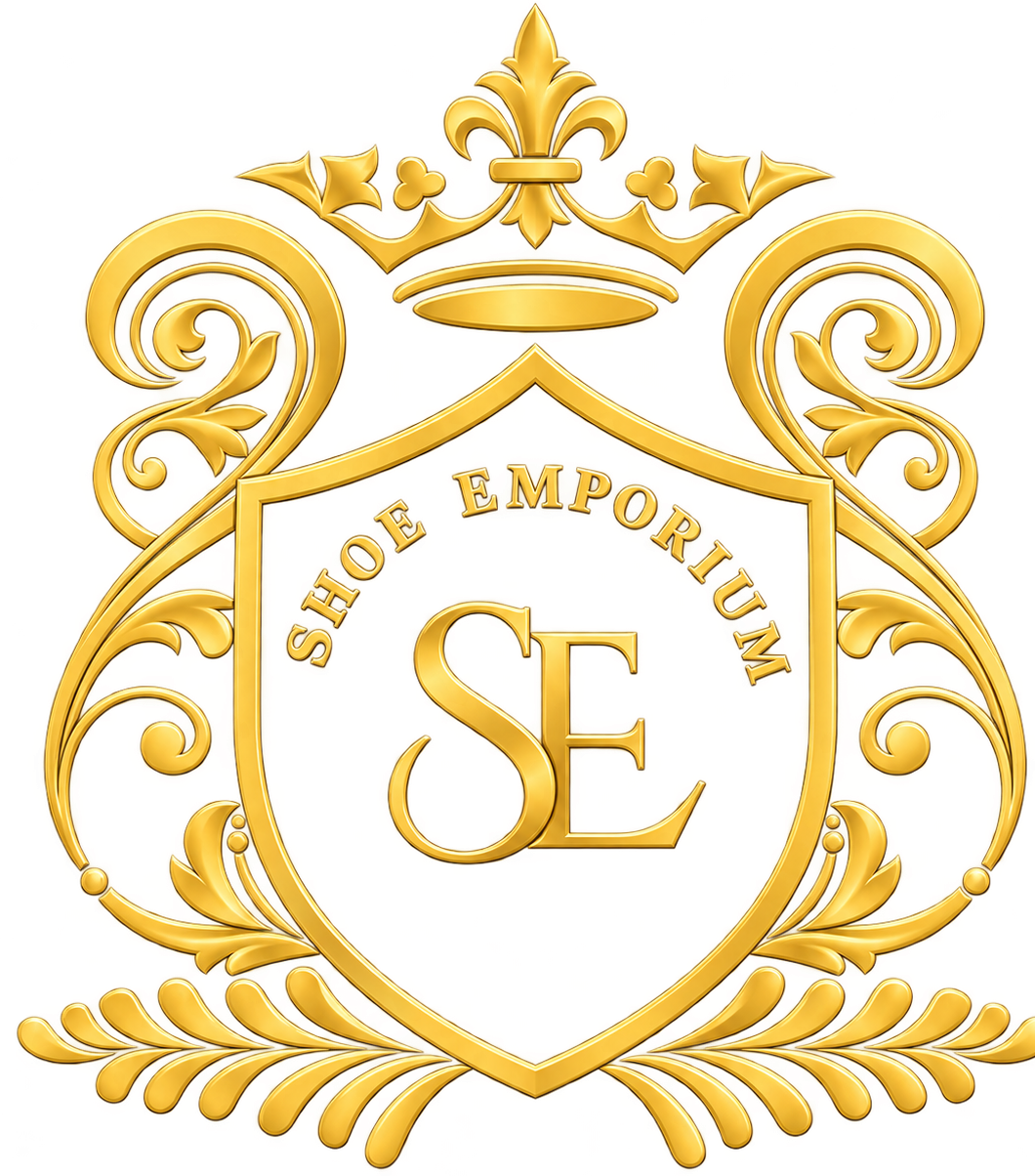 Gold heraldic crest logo for Shoe Emporium with "SE" monogram and crown
