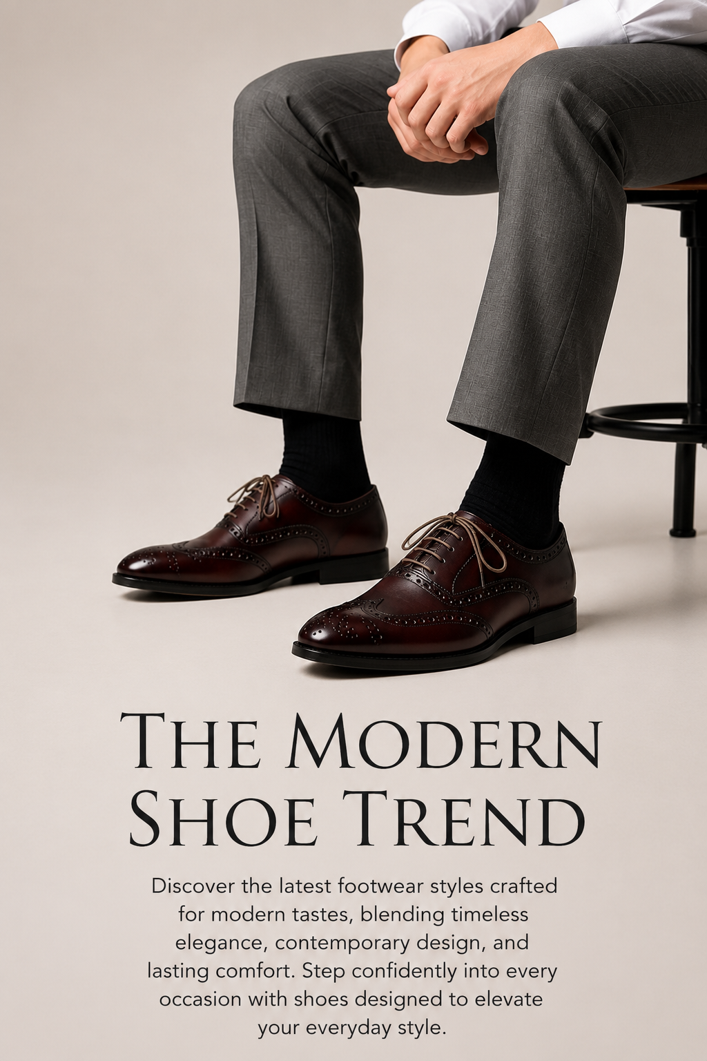 A pair of premium dark brown leather brogue dress shoes featuring detailed perforated accents and classic lace-up styling, paired with grey formal trousers.